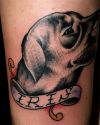 dog tattoo on leg