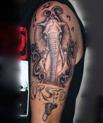 Elephant And Music Symbol Tattoo