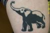 elephant image tattoo on leg