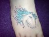 horse head tattoo on feet