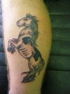 horse tattoo pic on leg