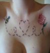 bee love tattoo on chest