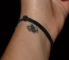 bee tattoo on wrist