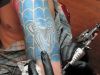 man inked tattoo on hand