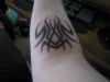 tribal spider tattoo