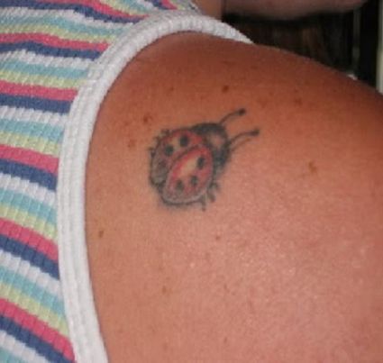 Ladybug Tattoo On Right Shoulder