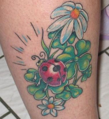 Ladybug And Flower Tattoo On Leg