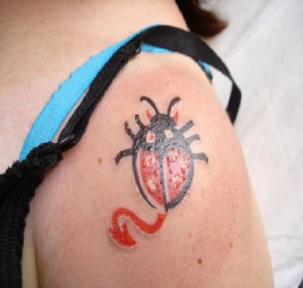 Ladybug Tattoo On Left Shoulder