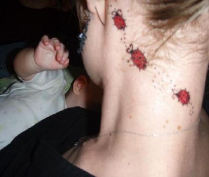 Ladybug Tattoo On Neck