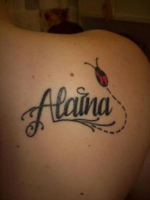 Ladybug And Text Tattoo