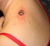 ladybug tattoo on shoulder