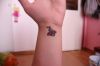 ladybug wrist tattoo