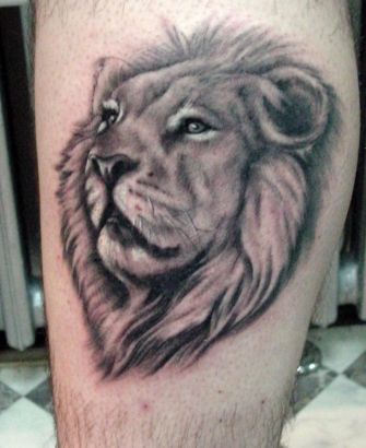 Lion Head Leg Tattoo