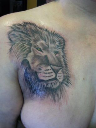 Lion Head Picture Tattoo On Chest