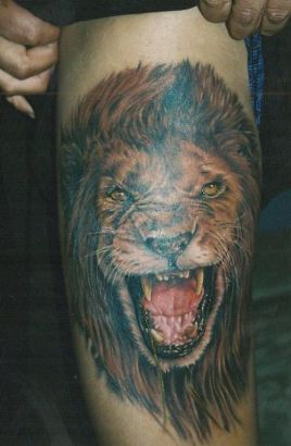 Lion Head Tattoo On Knee