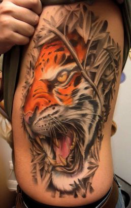 Lion Heads Tattoo On Rib