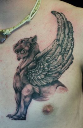 Lion Wing Tattoo On Chest