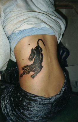 Panther Tattoo On Back Of Girl