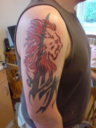 Red Tribal Lion Tattoo