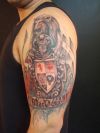 lion head pic tattoo on arm