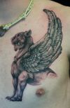 lion wing tattoo on chest