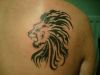 tribal lion head tattoo for back