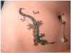 lizard tats on girl's stomach 