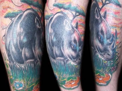 Rhino Tattoo On Legs