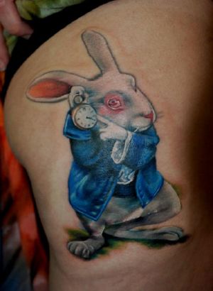 Rabbit Tattoo On Left Shoulder Blade