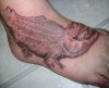alligator tattoo on feet