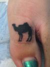 camel tattoo on toe