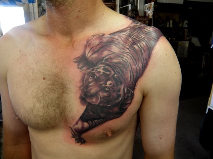 Tiger Tattoo On Chest Of Man