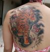 tiger and flower tattoo on back