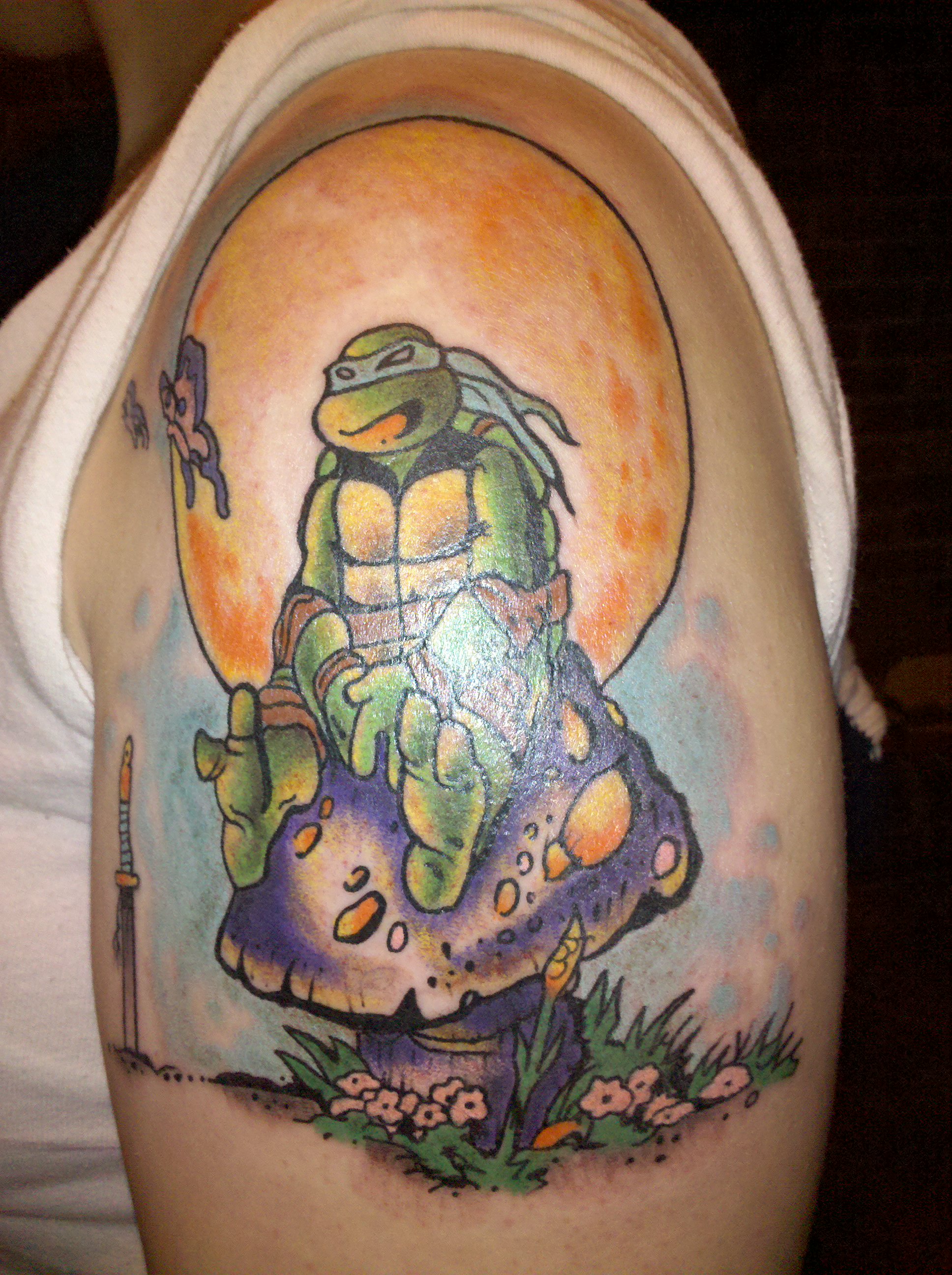 Right forearm tattoo of Leonardo, the ninja turtle, on