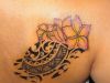 tribal turtle and flower tattoo