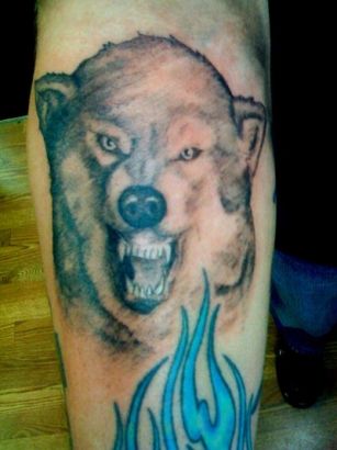 Flame And Wolf Head Tattoo