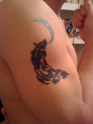 Tribal Wolf And Moon Tattoo