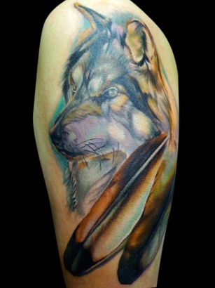 Wolf Head And Feather Tattoo