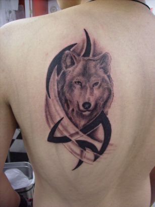 Wolf Head Tribal Tattoo On Back