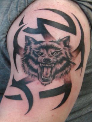 Wolf Tribal Tattoo On Arm