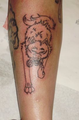 Wolf With Flower Tattoo