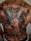 wolf tattoo on back