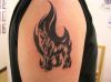 flaming wolf tattoos on arm