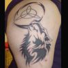 tribal wolf tattoo for man