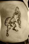 wolf  tats on side stomach