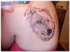 wolf tats on girl's back