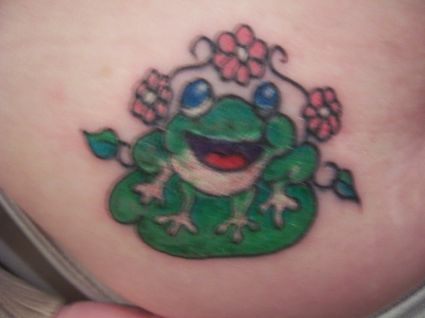 Frog And Small Flower Tattoo