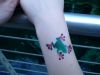 frog image of tattoo on arm