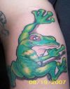 frog showing back tattoo