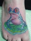 frog image of tattoo on feet